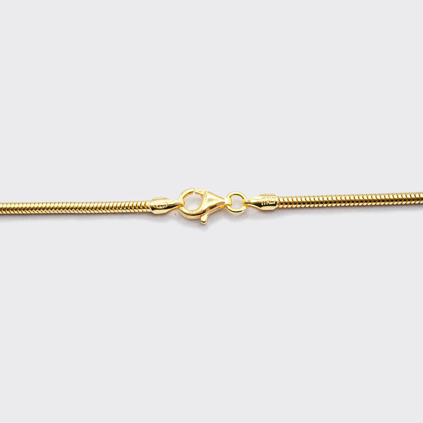 The Mamba necklace is made of 925 sterling silver, covered with 18K gold. The chain is handcrafted in Italy and made for both men and women.