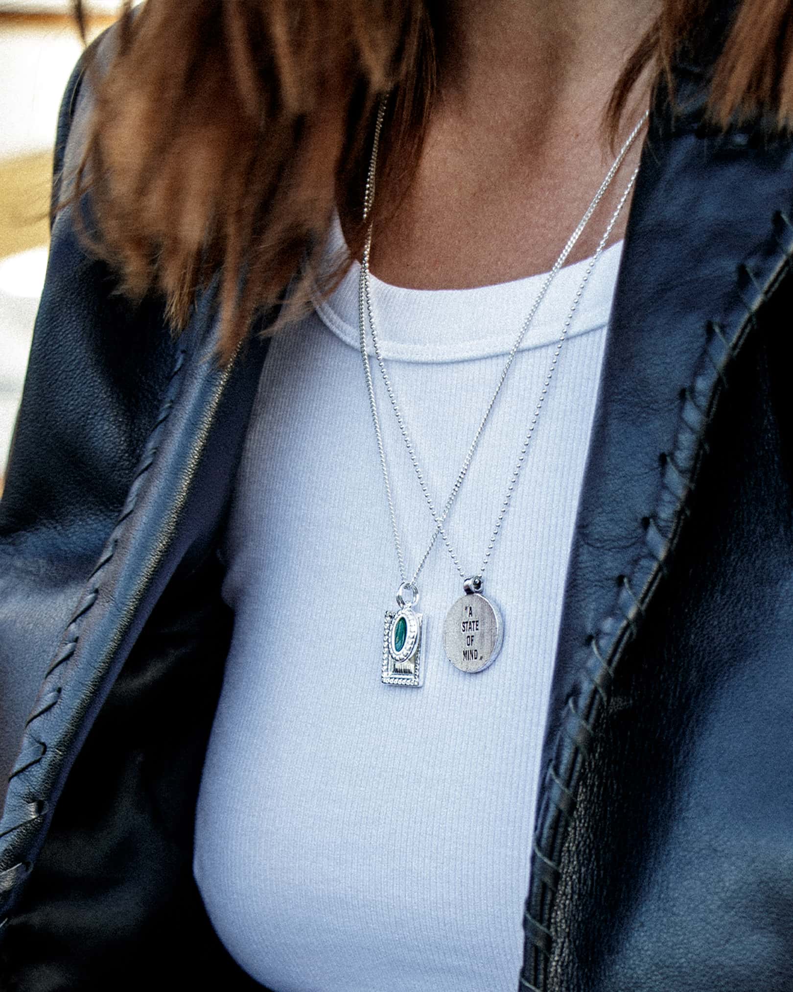 Atelier Domingo's State of Mind silver necklace is designed in France and made in Spain. This necklace is unisex, made for both men and women. The pendant is made of a high-quality 925 Sterling silver plating. The cuban chain is made of solid 925 Sterling silver.
