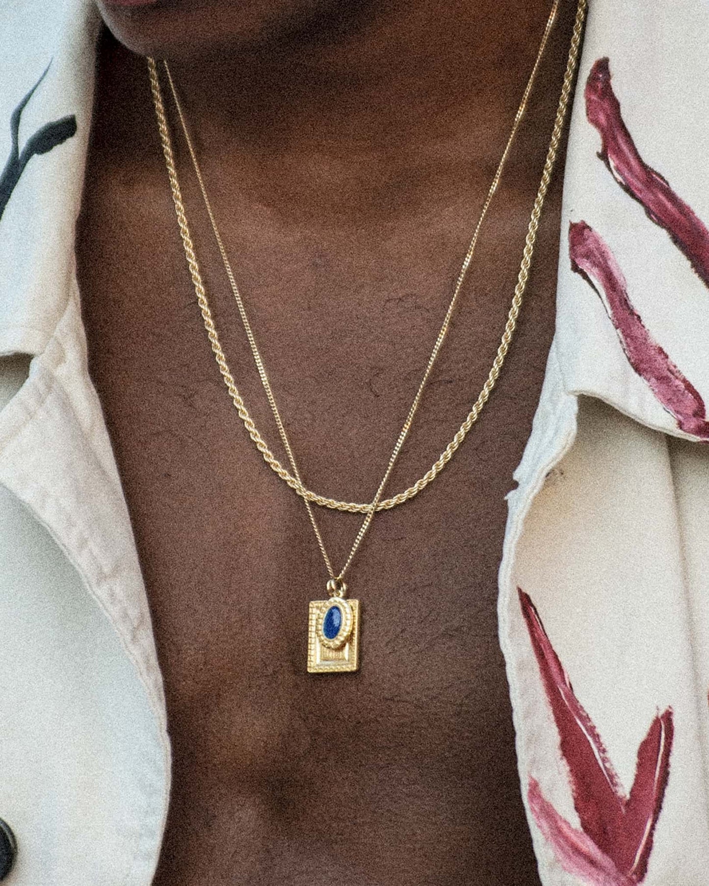 Atelier Domingo's Wallace necklace is a tribute to Christopher Wallace, a.k.a The Notorious B.I.G. Made in Spain, this jewelry is designed to be unisex, for both men and women. The pendant is made of a high-quality 24 karat gold plating. The cuban chain is made of solid 925 Sterling silver with a high-quality 18 karat gold plating.