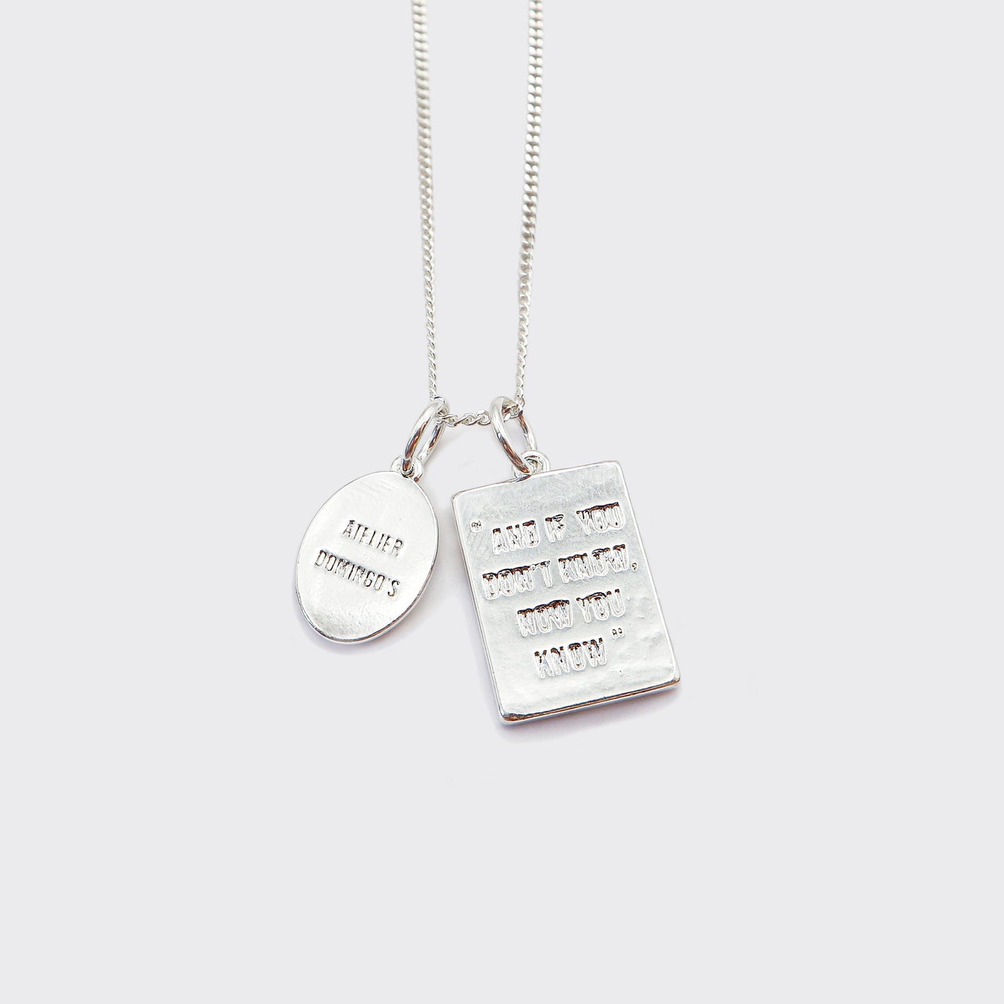 Atelier Domingo's Wallace necklace is a tribute to Christopher Wallace, a.k.a The Notorious B.I.G. Made in Spain, this jewelry is designed to be unisex, for both men and women. The pendant is made of a high-quality 925 Sterling silver plating. The cuban chain is made of solid 925 Sterling silver.