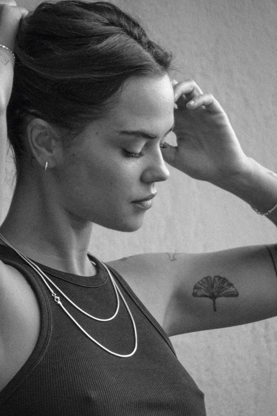 Judit for Atelier Domingo's, wearing our unisex chain collection. Made of 925 sterling silver, this collection has been designed in France and crafted in Italy.