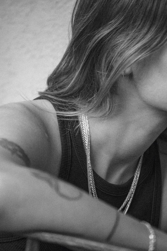 Judit for Atelier Domingo's, wearing our unisex chain collection. Made of 925 sterling silver, this collection has been designed in France and crafted in Italy.