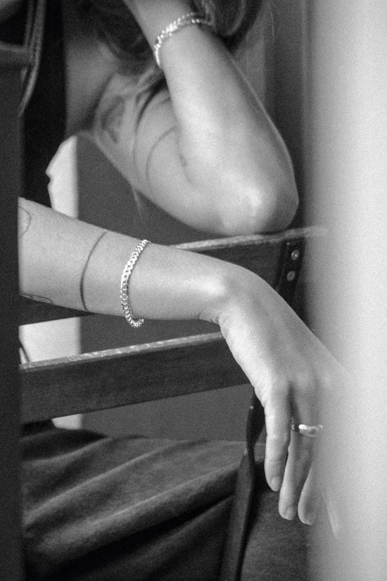 Judit for Atelier Domingo's, wearing our unisex chain collection. Made of 925 sterling silver, this collection has been designed in France and crafted in Italy.