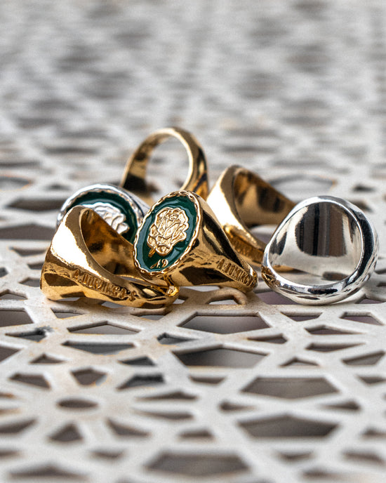 Atelier Domingo's is releasing a new version of its classic Do's ring. It is now available with a pine green handmade enamel. 