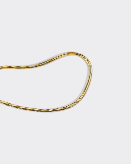 Atelier Domingo's Mamba gold bracelet is made of solid 925 Sterling silver with a high-quality 18 karat gold plating. This unisex bracelet is the classic snake chain. This jewelry is made in Italy and designed to be a bracelet for both men and women.