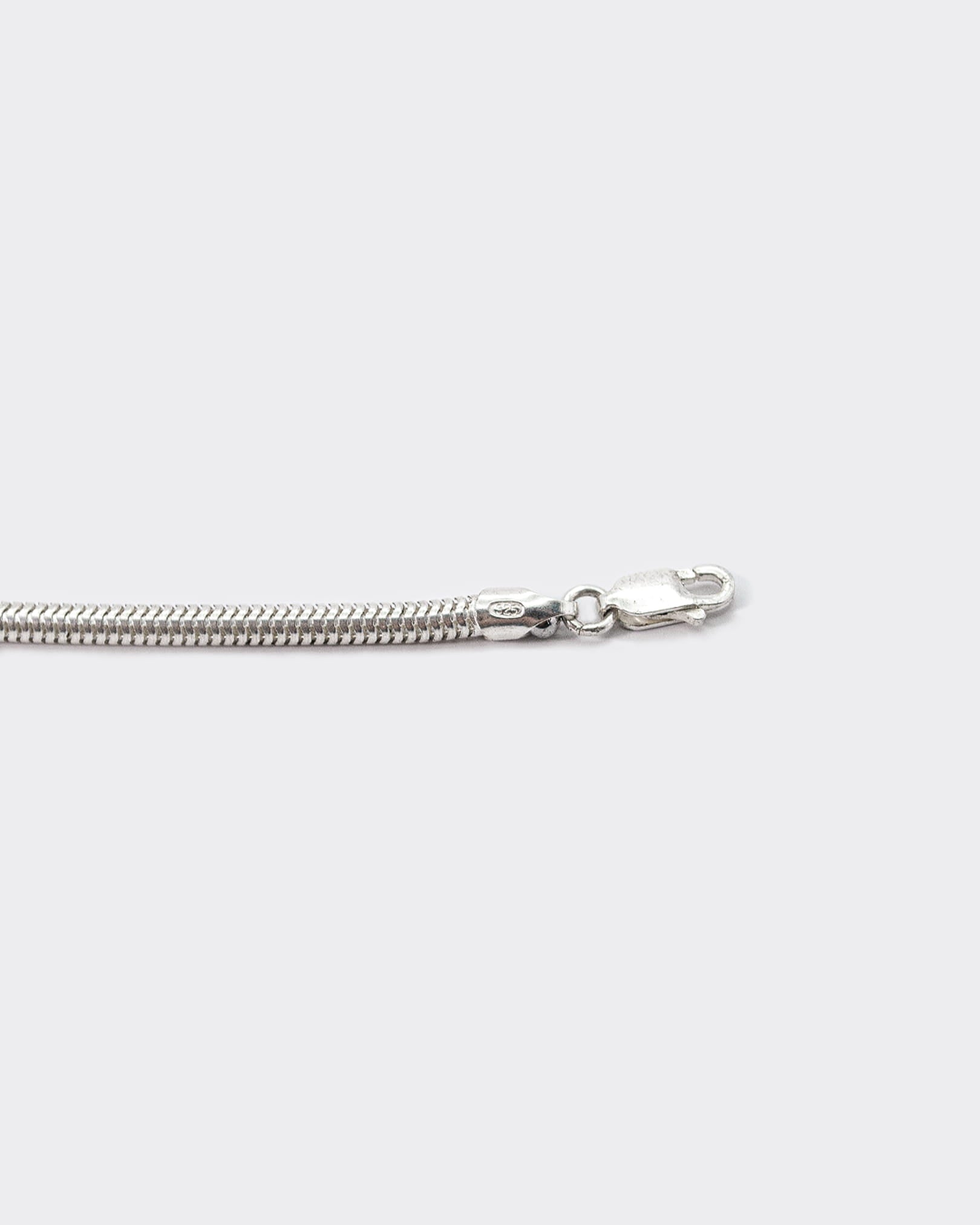 Atelier Domingo's Mamba silver bracelet is made of solid 925 Sterling silver. This unisex bracelet is the classic snake chain. This jewelry is made in Italy and designed to be a bracelet for both men and women.