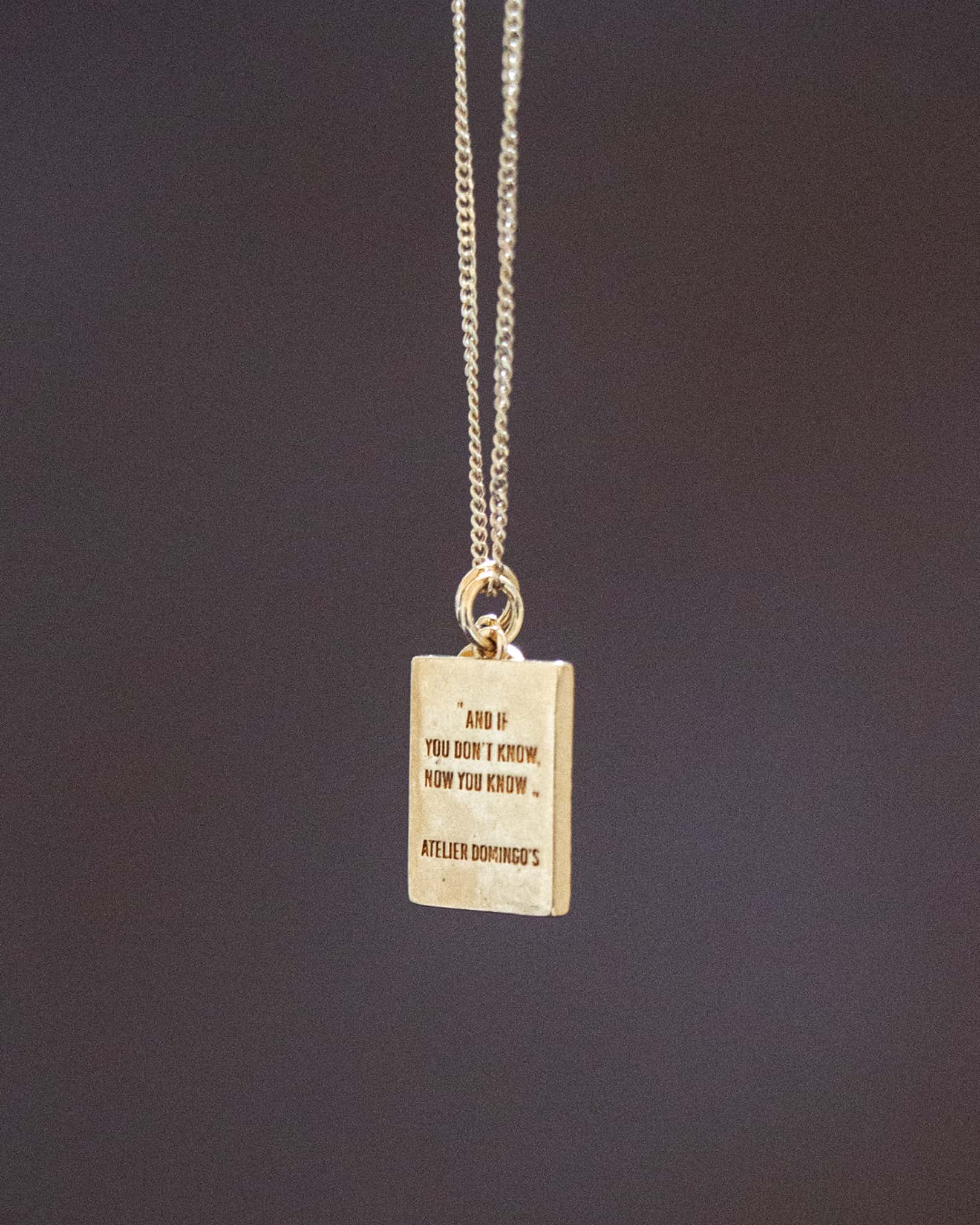 Atelier Domingo's Wallace necklace is a tribute to Christopher Wallace, a.k.a The Notorious B.I.G. Made in Spain, this jewelry is designed to be unisex, for both men and women. The pendant is made of a high-quality 24 karat gold plating. The cuban chain is made of solid 925 Sterling silver with a high-quality 18 karat gold plating.