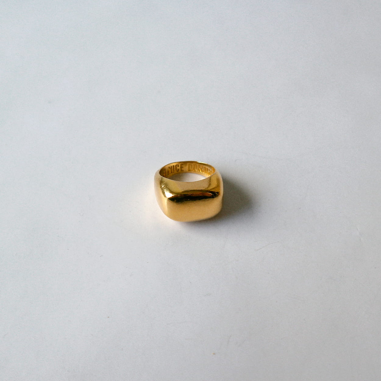 Atelier Domingo's Block gold ring is a tribute to New York block parties. This unisex ring is made in Spain. It is made of a high-quality 24 karat gold plating. All our jewelry is unisex, made for both men and women.