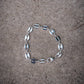 Atelier Domingo's La Mar bracelet is the classic coffee beans chain. It is made in Spain and this jewelry is made for both men and women. This unisex bracelet is made of a high-quality 925 Sterling silver plating.